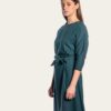 Elegant dress with loose sleeves and a belt